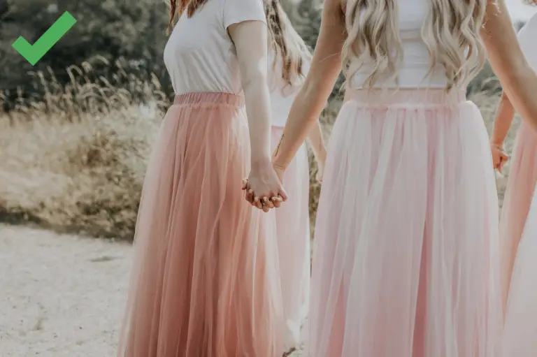 Women wearing flattering pink skirts that work well for petite women.