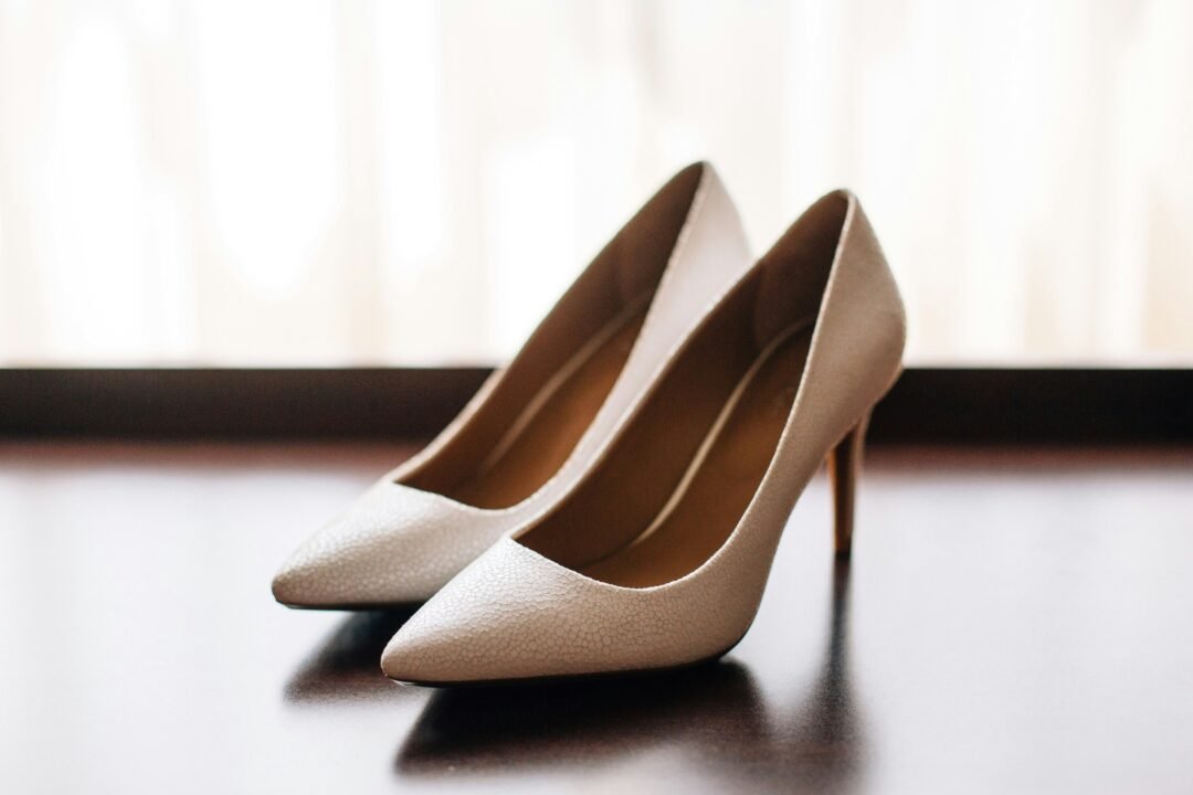 Pair of nude pointed-toe high heels with a low-vamp design, a flattering shoe style for petite women.
